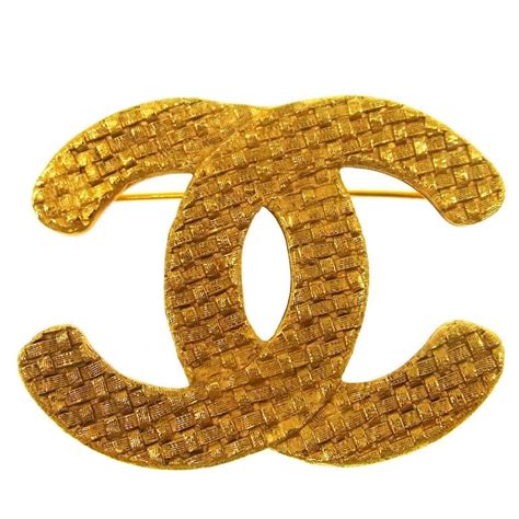 chanel brosche gold|Chanel lapel brooch.